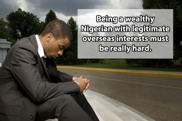 black man thinking - Being a wealthy Nigerian with legitimate overseas interests must be really hard.