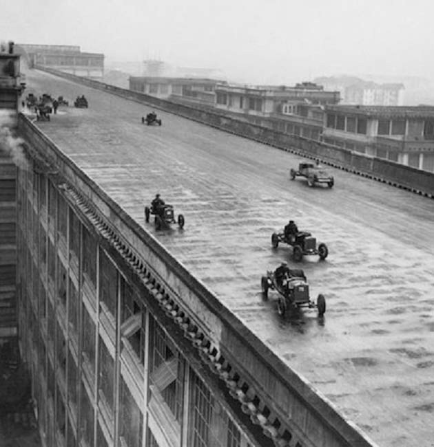 Factory workers race on the roof test track of Fiat factory in Turin, Italy, 1923
