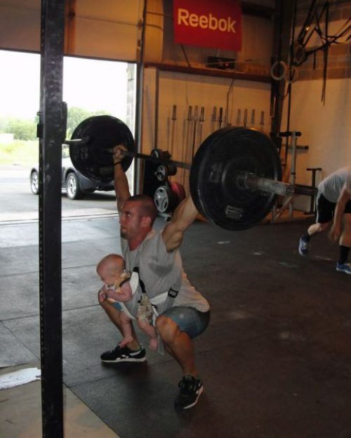 parenting fails - baby and daddy with weights - Reebok