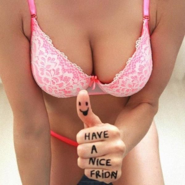 Hot girl wearing bikini with thumbs up and smiling face saying have a nice day.