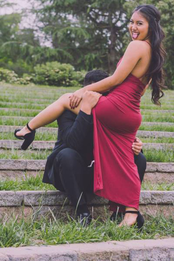 Girl posing crassly in formal photoshoot