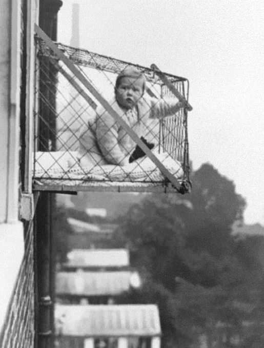 Child cages, that we placed outside apartments in the 30s so that children got enough sun