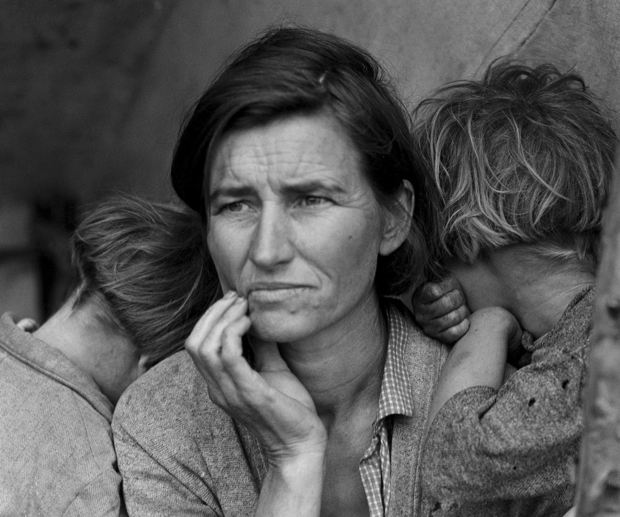 Migrant Mother -  This image of an impoverished woman with two of her seven children at a pea-pickers camp in Nipomo, California was shot by photographer Dorothea Lange in 1936. The photo was taken to document the plight of migrant agricultural workers and was published in newspapers, prompting the government to deliver food aid to the Nipomo camp. The woman, 32 years old at the time and identified decades later as Florence Owens Thompson, was critical of Lange and stated that she felt the photo was exploitative and wished it hadn’t been taken. She also expressed regret she hadn’t made any money from it. Thompson died at age 80 in 1983.