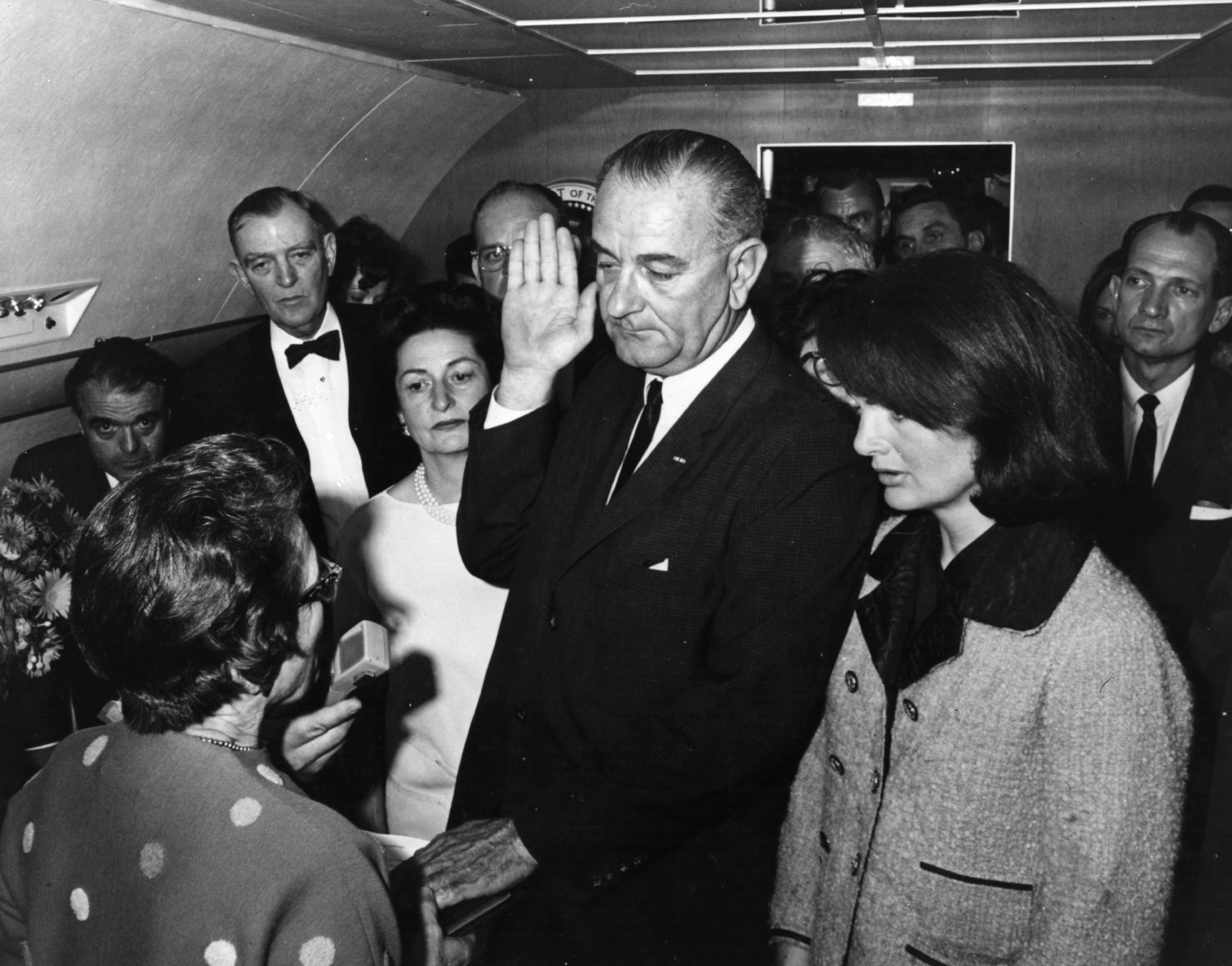 Lyndon Johnson, Air Force One - Former army photographer Cecil Stoughton, the first person to hold the post of White House photographer, took this historic photo of Judge Sarah Hughes administering the oath of office to a solemn Lyndon Johnson mere hours after President John F. Kennedy was assassinated on November 22, 1963. Johnson is surrounded by a group of staffers, as well as his wife and a bewildered-looking Jaqueline Kennedy, who is still wearing the pink Chanel suit she had on when her husband was shot. The only photographer on the plane when Johnson was inaugurated, Stoughton’s camera initially malfunctioned and it appeared there wouldn’t be any photographic record of the event. Thankfully, he quickly fixed the problem and was able to document it.