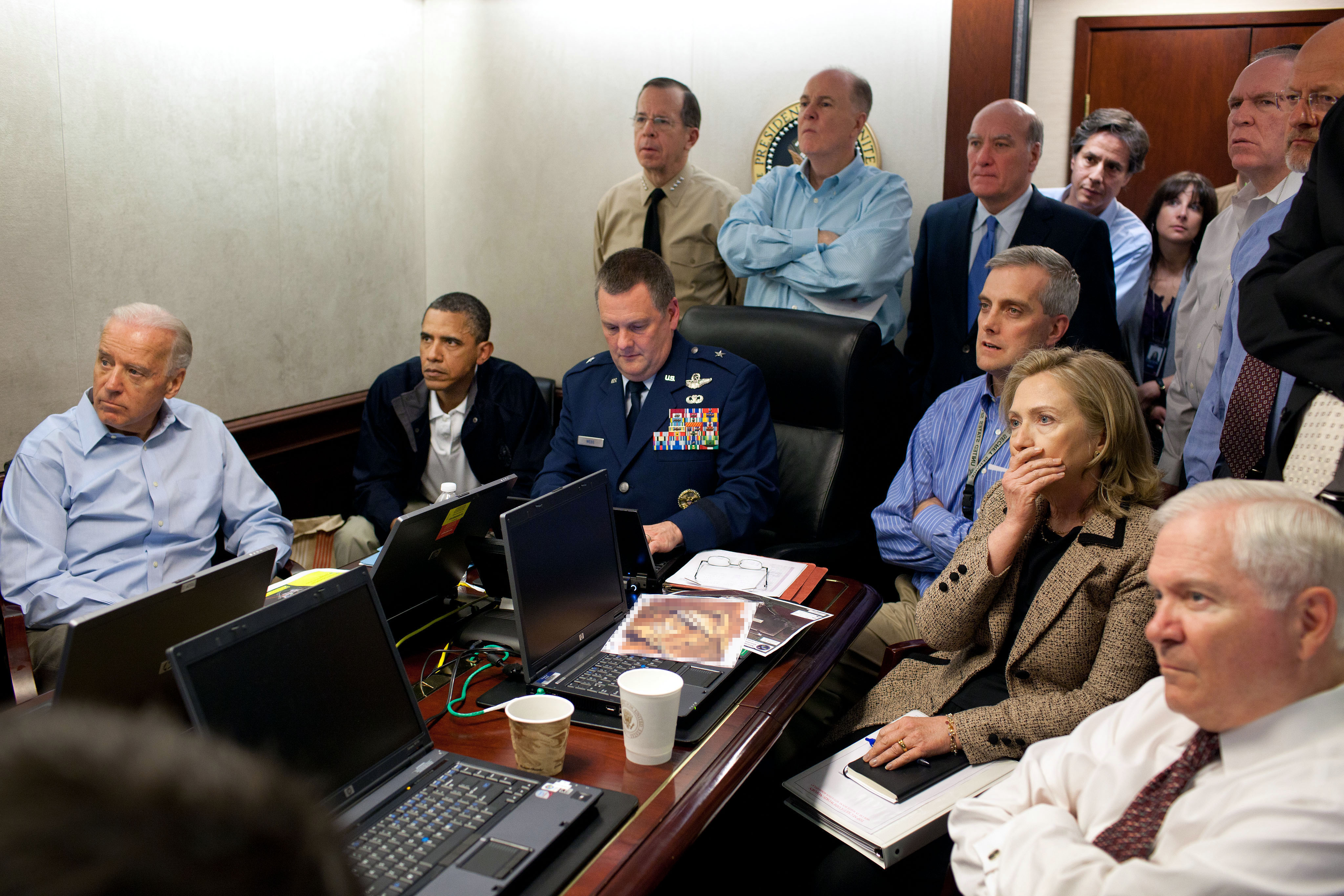 The Situation Room - Taken by Pete Souza on the afternoon of May 1, 2011, this image shows President Barack Obama and his national security team crowded into a small conference room in the West Wing’s Situation Room, receiving updates as US forces raided Osama bin Laden’s Pakistan compound and killed the terrorist leader. Photographs of bin Laden’s body have never been released, making Souza’s photo the only public image of one of the defining moments of the war on terror.