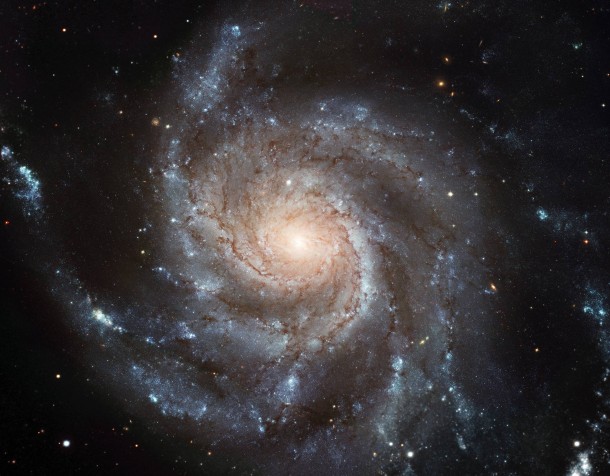 This giant spiral disk of stars, dust and gas is 170,000 light-years across, or nearly twice the diameter of our Milky Way galaxy. M101 is estimated to contain at least one trillion stars