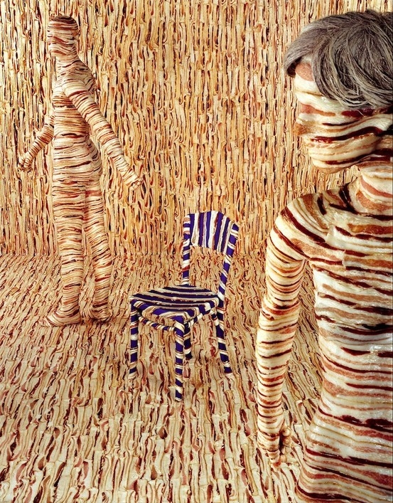 Amazing photography by installation artist Sandy Skoglund. She began doing scenographies a decade before Photoshop was even invented. Everything here is covered with strips of bacon!