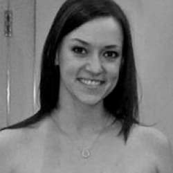 Kansas native Michelle Preston who isn't naked here, but wearing a tube top in this picture was a married teacher who coached the Freshman cheerleading squad. She was fired once it was discovered that there were various naked pictures of her in various poses that prove how flexible she is circulating around the high school. She reached out to her 3 victims through Facebook, which then led to her having sex with these young boys a recorded 15 times. Police uncovered her victims' DNA on her couch cushions.