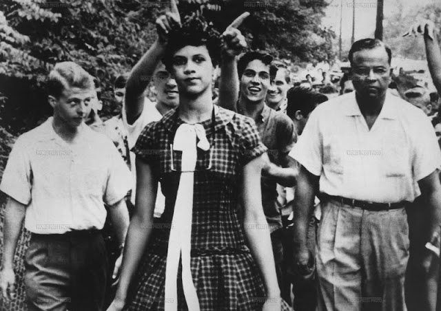 Dorothy Counts, one of the first black students to enter the newly desegregated Harry Harding High School is mocked by whites on her first day of school