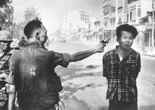 South Vietnam national police chief Nguyen Ngoc Loan executes a suspected Viet Cong member.