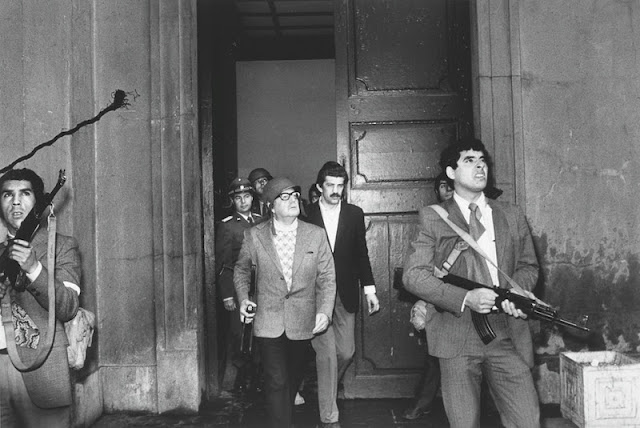 Democratically elected President Salvador Allende moments away from death during military coup at Moneda presidential palace in CHile