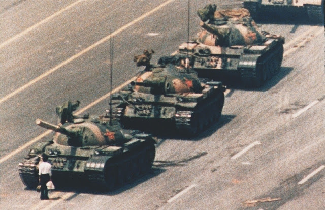 A demonstrator confronts a line of People's Liberation Army tanks during protests for democratic reform.