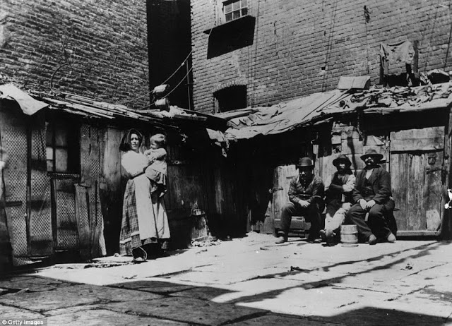 The sight of Italian immigrant families in New York on Jersey Street, living in shacks could be a scene from the developing world today