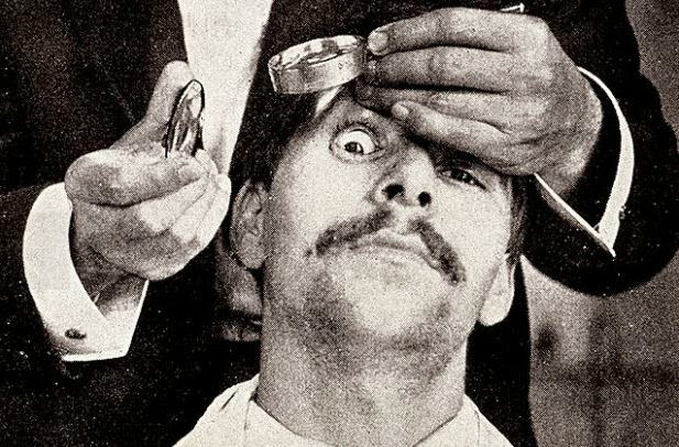 Eye exam by candlelightWhat's the best light source for looking inside the eye? Until the end of the 1920s, when the electric "slit lamp" became widely available, candlelight was the best bet - as shown in this 1910 photograph. Examining the interior of the eye made it possible to conquer many eye diseases.