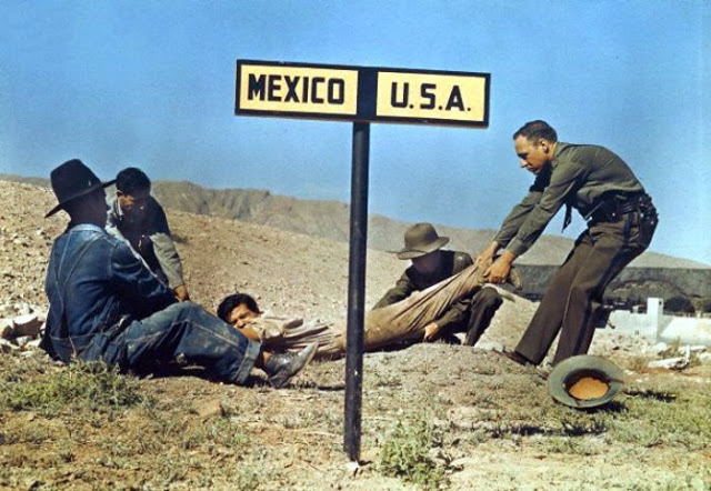 Two border patrol officers attempt to keep a fugitive in the US, 1920s