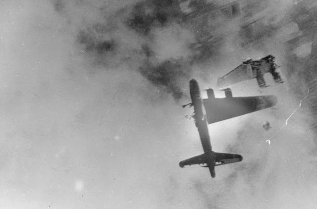 The Boeing B17 "Wee Willie" has its left wing blown off by flak over Crantenburg, Germany. April 10, 1945
