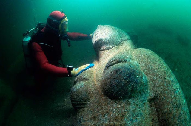 Colossus of a Ptolemaic queen made out of red granite. The whole statue measures 490 cm in height and weighs 4 tons. It was found close to the big temple of sunken Heracleion.