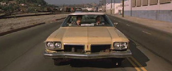 It also showed up as a henchman's ride in Darkman during a chase scene in which the titular character lands on its hood.