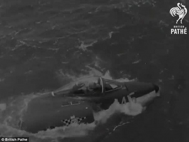 Trapped: The pilot was left stuck in the cockpit of the rapidly sinking aircraft after it rolled off the edge of HMS Victorious