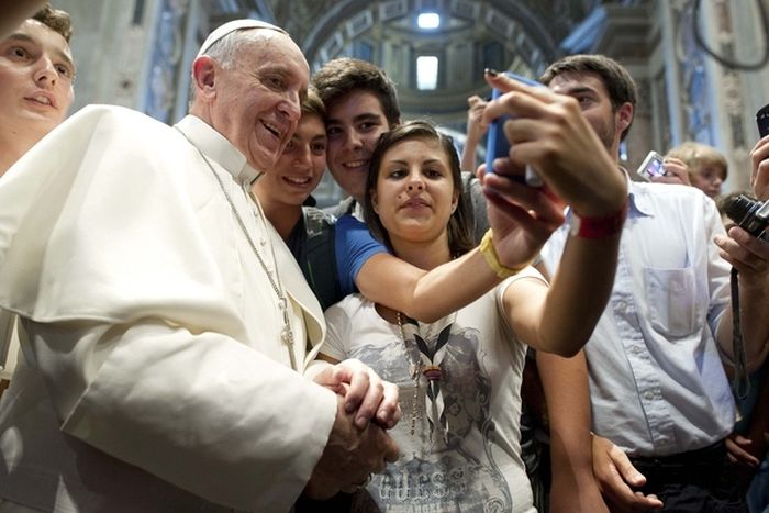 The world famous selfie with Pope Francis.