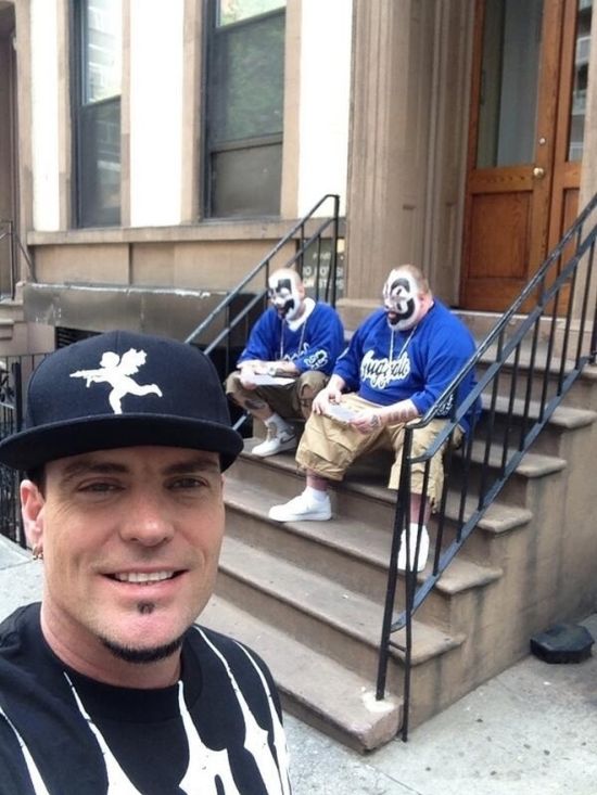 The Vanilla Ice taking a selfie with Insane Clown Posse selfie.