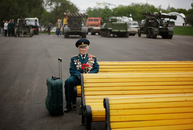 He's a Russian soldier who went through WWII. He goes to this military parade every year to meet up with his old friends that he served with. Every year they always came and it was rare one didn't show up. Most of the time, they had died and already prepared for it, gone to funerals, etc. This particular year, he was alone. No warning, no nothing. The trip was a few hundred miles for him and after all that, he just sat down, alone.
