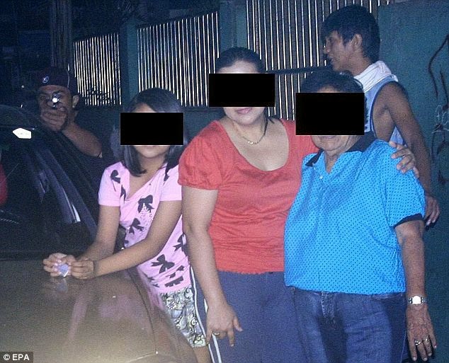 Filipino politician taking family photo moments before being assassinated