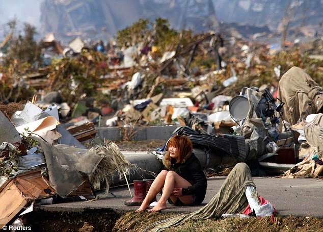 Girl devastated after the tsunami hit in Japan.