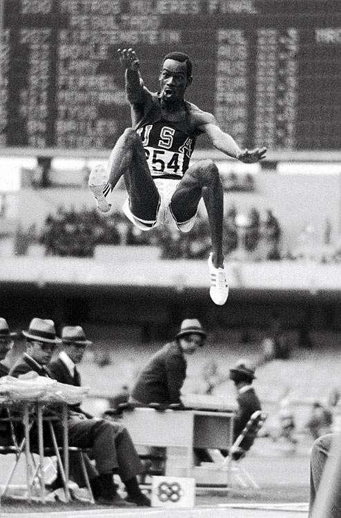 U.S. track and field athlete Bob Beamon flies through the air during his world record long jump of 8.9 meters at the 1968 Summer Olympics in Mexico City. Beamons jump, which inspired a new adjective for spectacular feats Beamonesque, stood as the world record for 23 years.