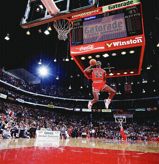 Air Jordan takes off from the free throw line and soars to a perfect score of 50 to defeat Dominique Wilkins in the finals of the Slam Dunk Contest. It was the second straight title for the Bulls star, and the 88 contest is widely considered the best ever because of the duel between Jordan and Wilkins.
