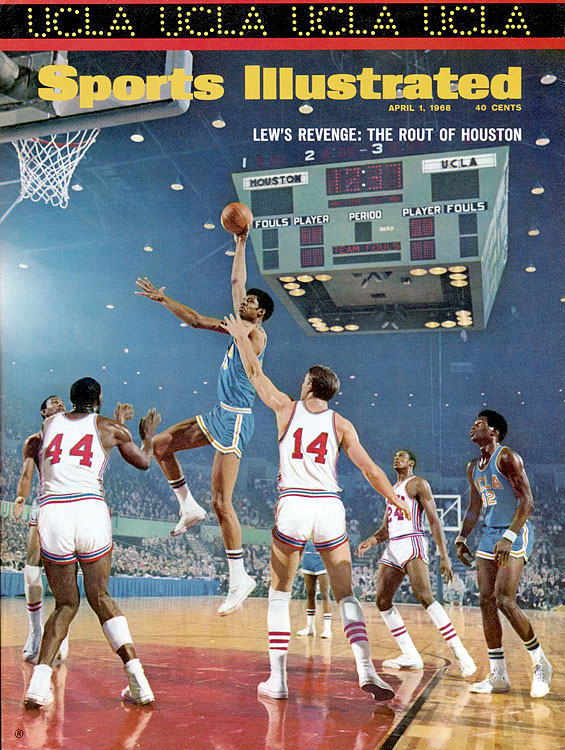 Lew Alcindor shoots his trademark skyhook as UCLA drubs Houston 101-69 in the national semifinals. Houston beat UCLA in January in what was dubbed The Game of the Century, but Lew Alcindor and the Bruins got the last laugh en route to the second of what would be seven straight national titles.