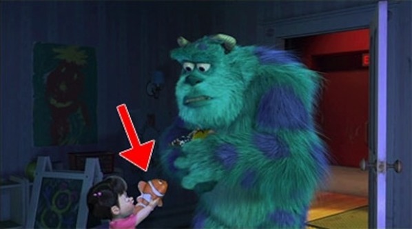 Monsters Inc.      Boo shows sully a doll of Nemo from Finding Nemo