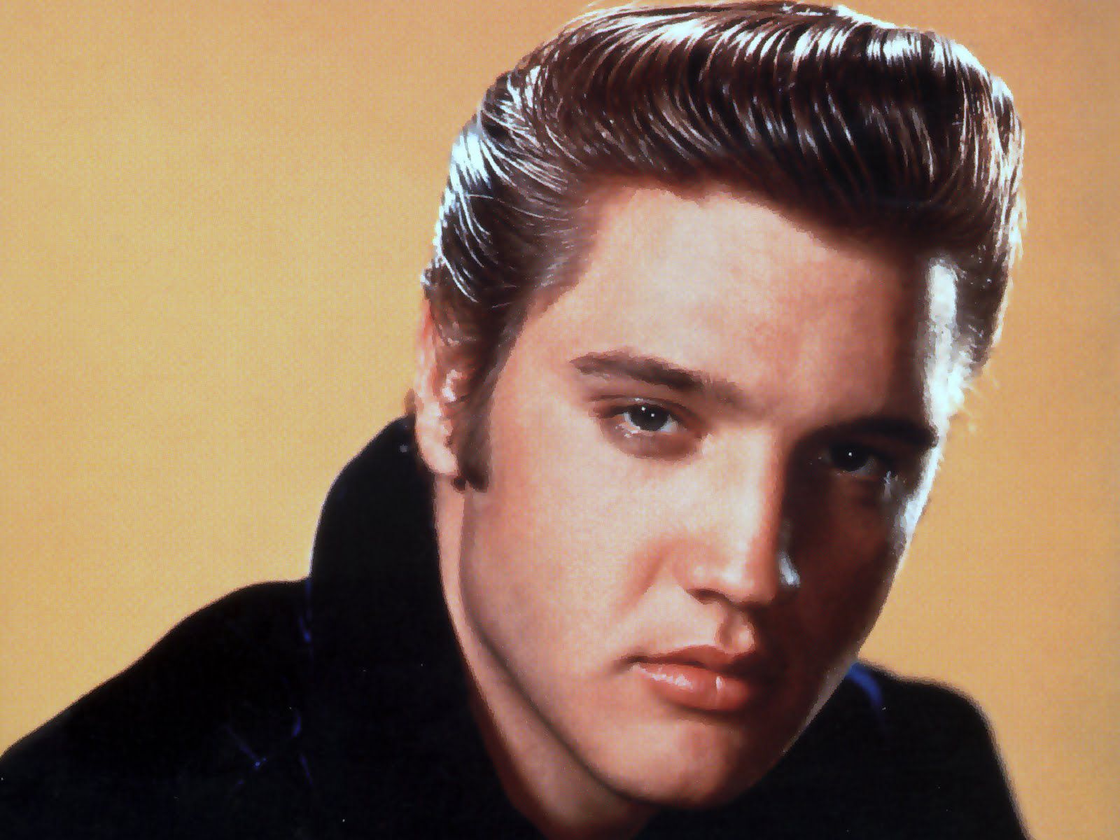 Elvis was a natural blonde. He began dying his hair black in high school.