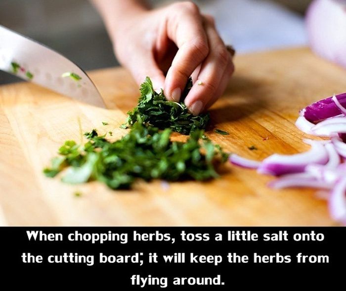 kitchen cooking tips - When chopping herbs, toss a little salt onto the cutting board; it will keep the herbs from flying around.
