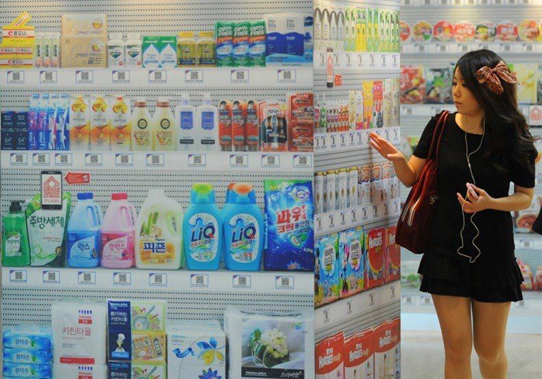 Worlds First Virtual Shopping Store opens in Korea. All the Shelves are infact LCD Screens. User Choose their desired items by touching the LCD screen and checkout at the counter in the end to have all their ordered stuff packed in Bags