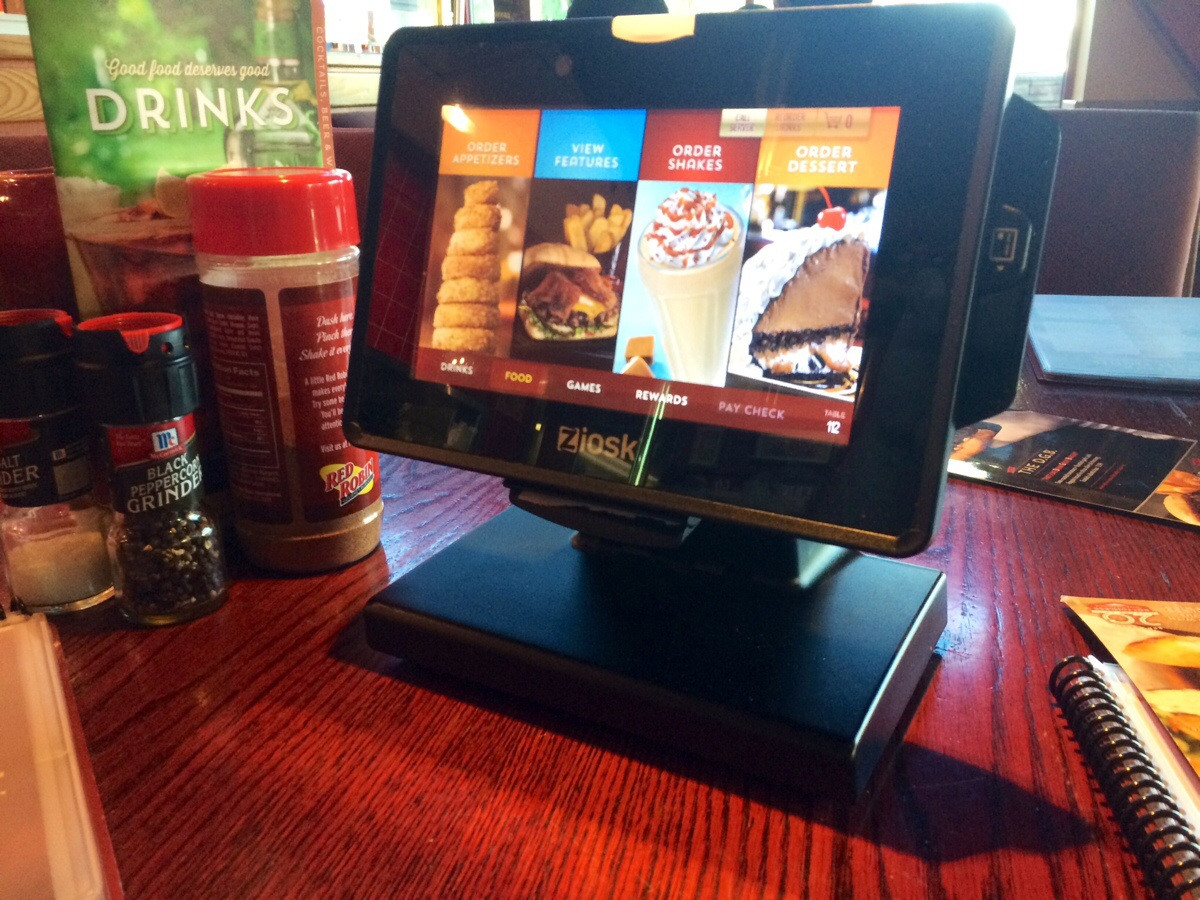 Dedicated tablet for ordering, games payment at restaurant table. Complete with receipt printer and card reader