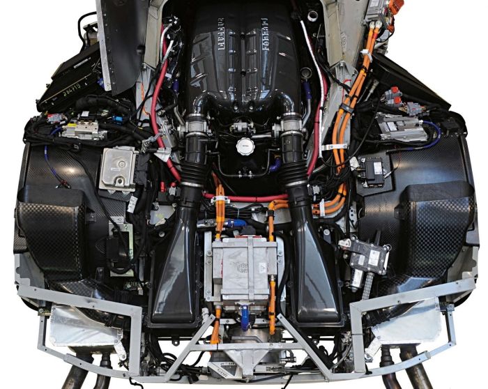 LaFerrari     6.3L V12 engine with an extra electric motor. 963 horsepower, 664 ft-lbs. torque. 0-60 in 2.9 seconds.