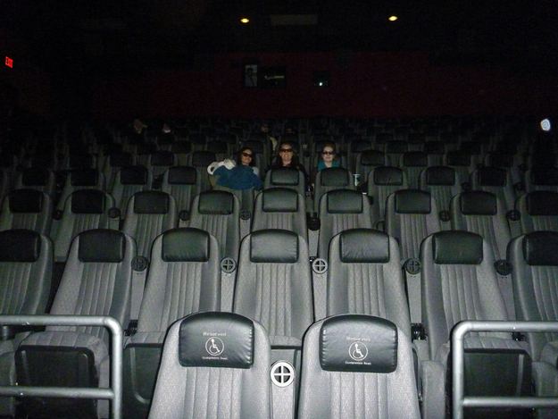 Seeing a movie in an empty theater.