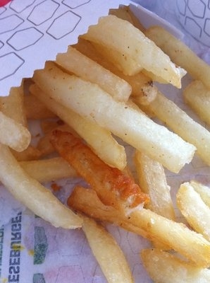 Finding a curly fry in your order of regular fries.