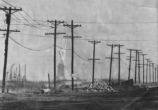 The Statue of Liberty as seen from Jersey City in 1973. Looks like some sci-fi dystopia