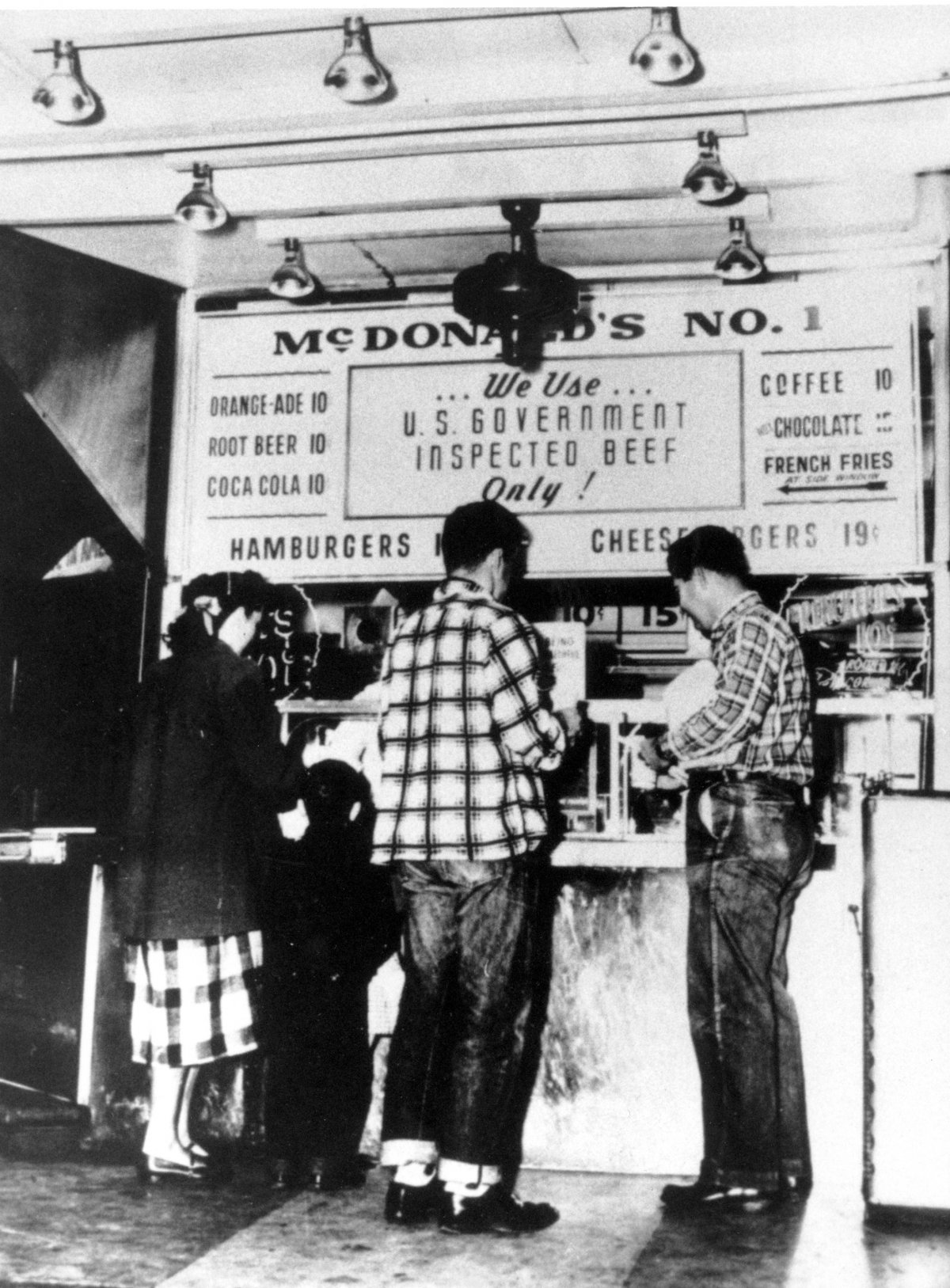 Customers line up outside the first McDonalds hamburger stand which was opened in 1948 by brothers Dick and Maurice McDonald in San Bernadino, California