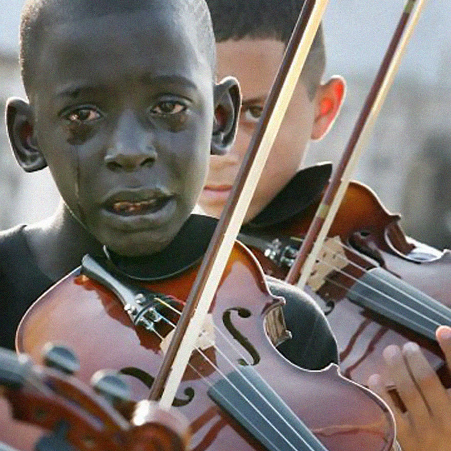 12 year-old Brazilian boy Diego Frazo Torquato, playing the violin at his teachers funeral.
