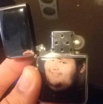 When you open the lighter he tips the fedora lol