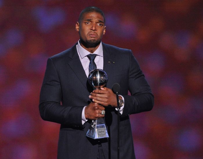 The first out gay NFL player, Michael Sam, accepts the Arthur Ashe Courage Award onstage during the 2014 ESPYS at Nokia Theatre L.A. Live on July 16, in Los Angeles, California.