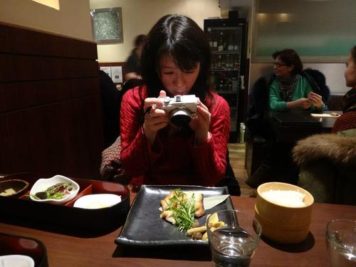 People taking pictures of their food
