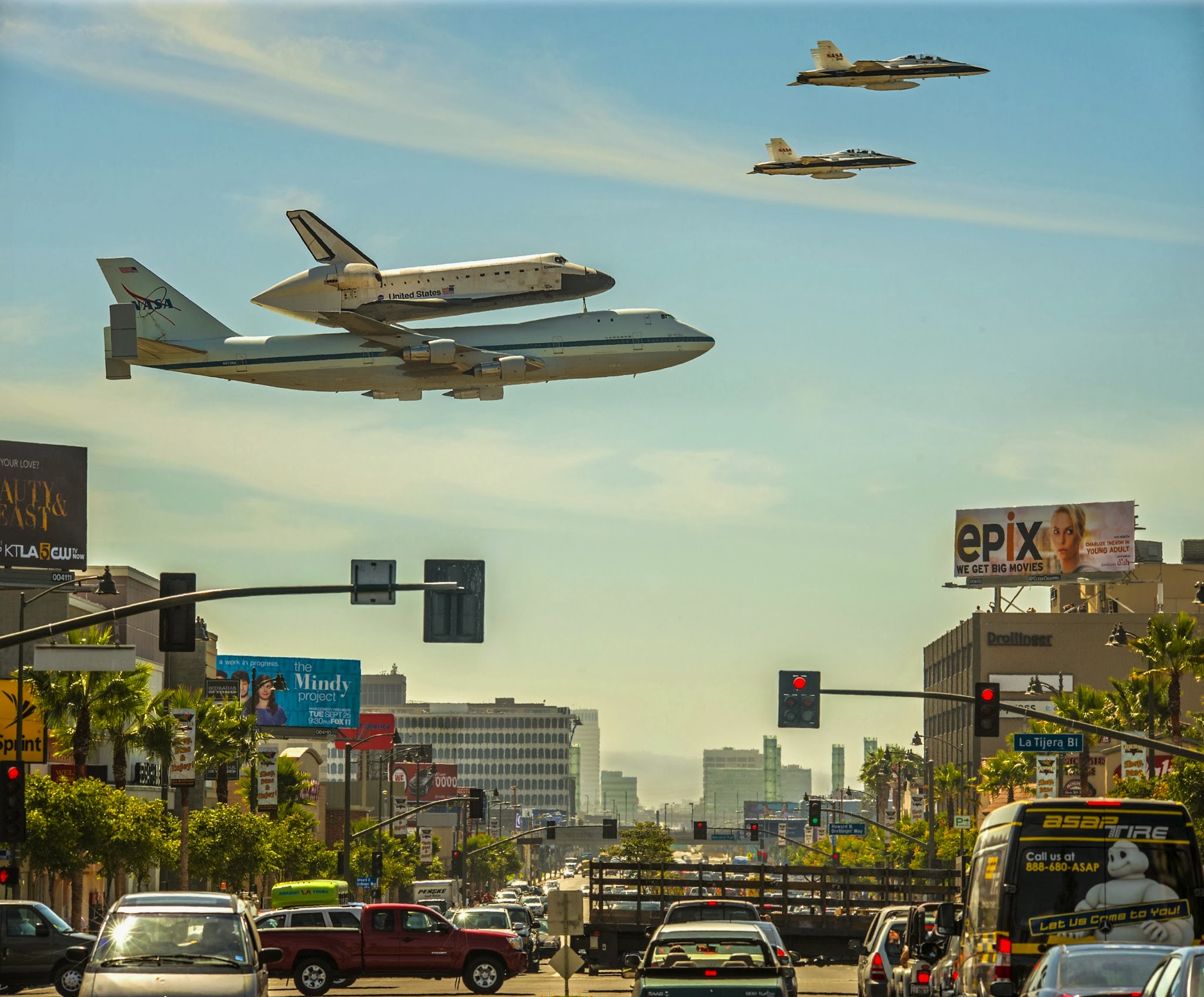 The space shuttle being carried by a 747 and escorted by two F-18’s… 

It can hold the fucking space shuttle but I get hit with extra baggage fees