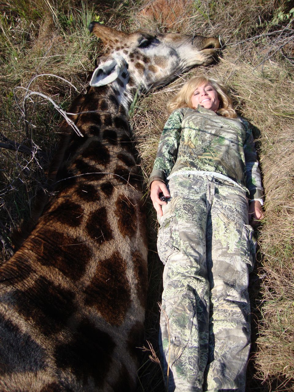 Rebecca Francis posing next to her kills…using a high powered rifle to shoot an animal is not a ‘sport’