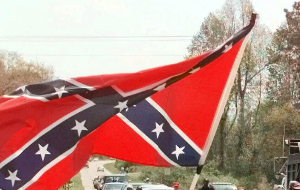 In Parker, CO a group of students posed with assault rifles and a Confederate flag before their prom, while their parents egged them on and presumably made sure their corsages were in pristine condition.