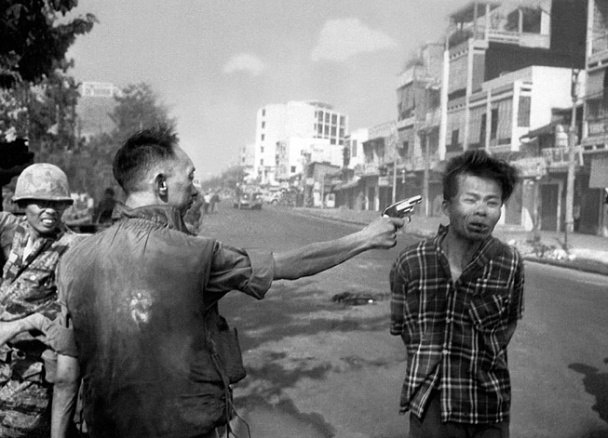 South Vietnam’s police chief fires his pistol into the head of a suspected Viet Cong officer in Saigon, February 1, 1968