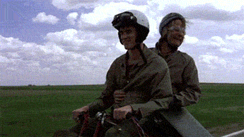 Better every loop combined GIF of Dumb and Dumber and Mad Max films scary road interactions